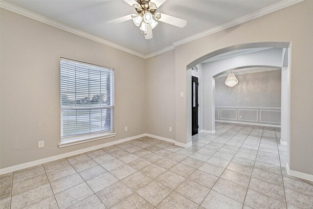 6530 Fm 3180 W, Mont Belvieu, TX 77523 - spare room with crown molding, arched walkways, a ceiling fan, light tile patterned floors, and baseboards