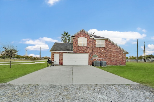 exterior space featuring central air condition unit, a lawn, and a garage