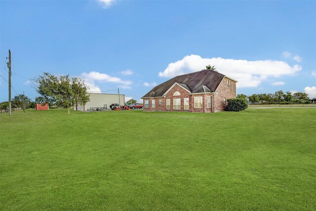 6530 Fm 3180 W, Mont Belvieu, TX 77523 - view of grassy yard