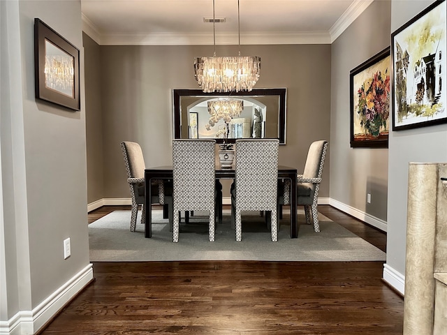 dining room with crown molding, an inviting chandelier, and dark hardwood / wood-style floors