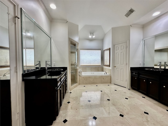 bathroom with vanity, a relaxing tiled tub, ornamental molding, and vaulted ceiling