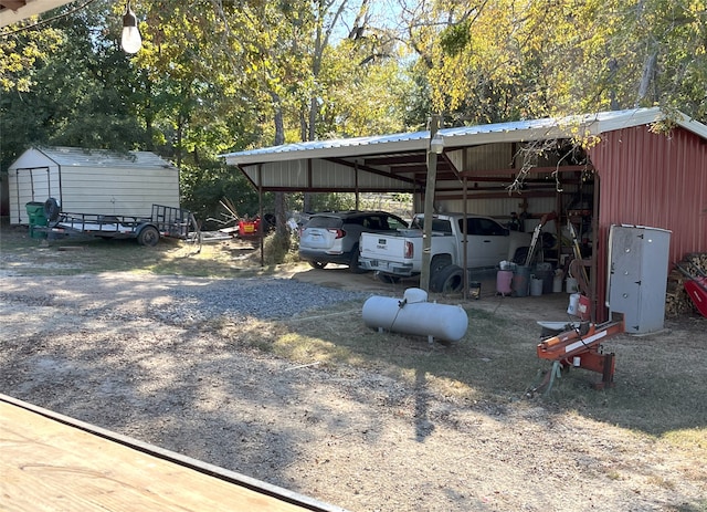 view of parking / parking lot featuring a carport