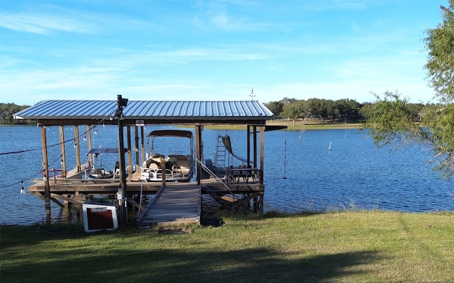 dock area featuring a yard and a water view