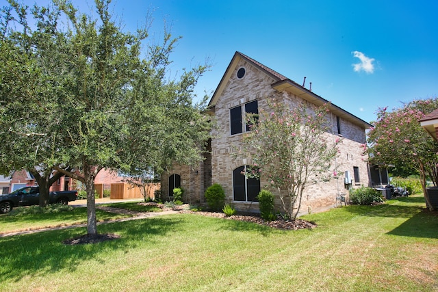 view of property exterior with a yard