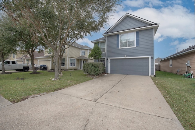 view of front property featuring a garage and a front yard