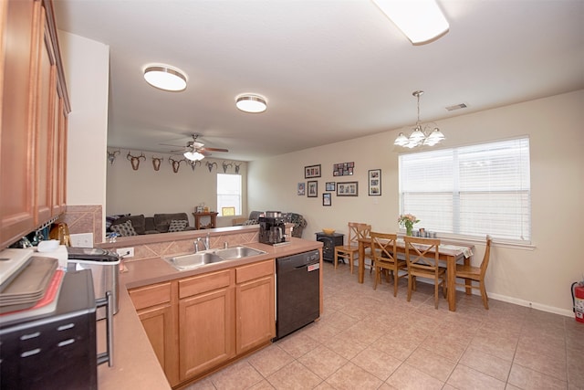 kitchen featuring dishwasher, sink, a healthy amount of sunlight, and ceiling fan with notable chandelier