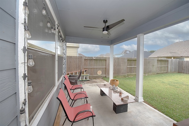 view of patio / terrace featuring ceiling fan