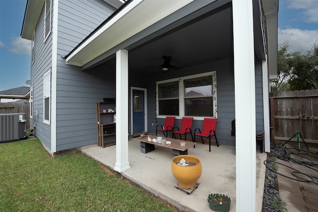 view of patio with ceiling fan and central AC