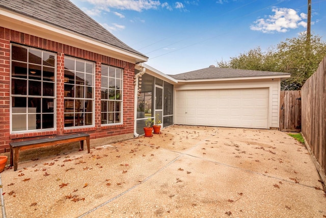 exterior space with a garage