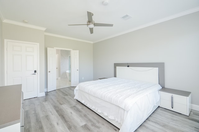 bedroom featuring ornamental molding, ensuite bathroom, ceiling fan, and light hardwood / wood-style flooring