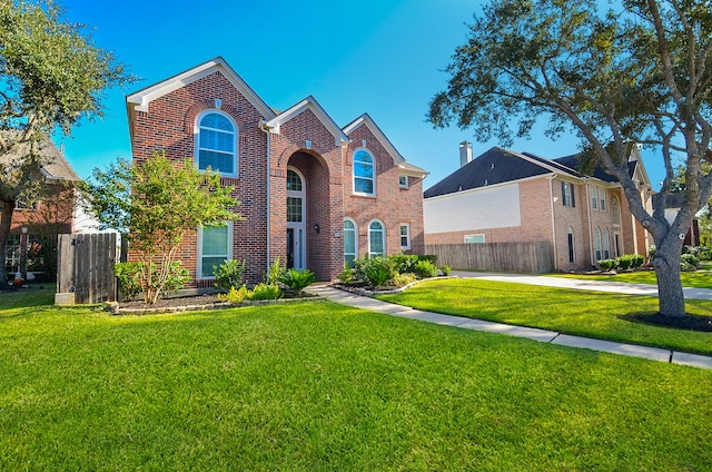 front facade featuring a front lawn