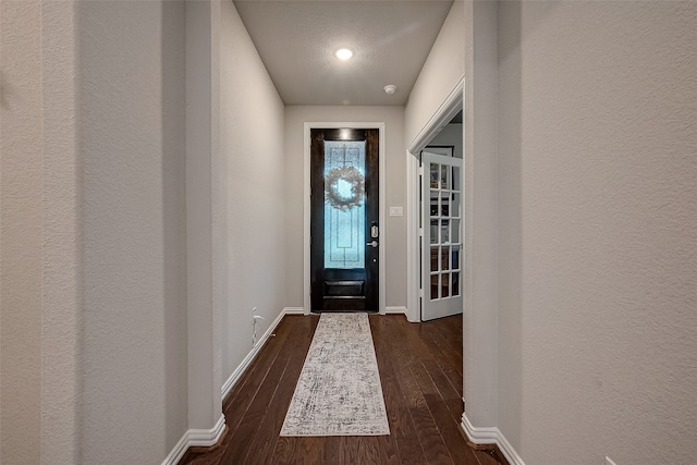 doorway featuring dark hardwood / wood-style flooring