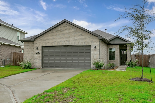 view of front facade featuring a garage and a front lawn