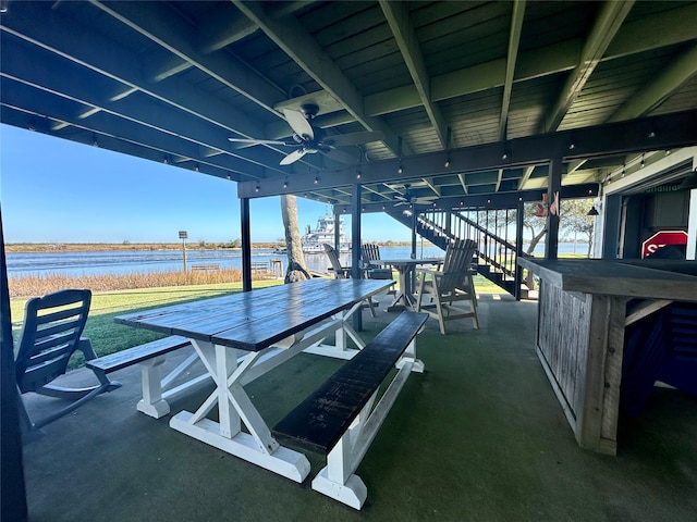 dock area with a water view