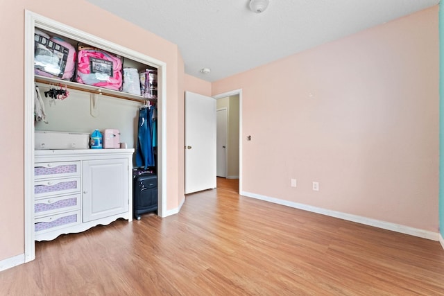 bedroom with light hardwood / wood-style flooring