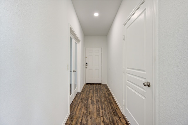 hall featuring dark wood-type flooring