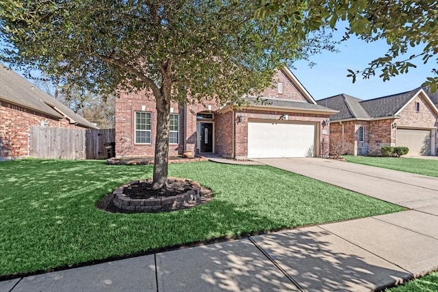 view of front of house featuring a garage and a front yard