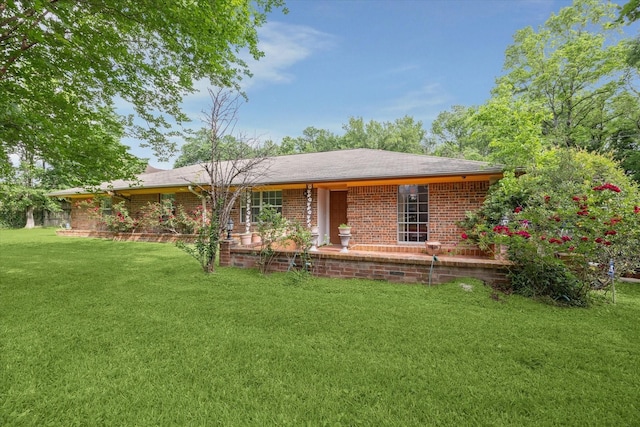 view of front of property with a front lawn