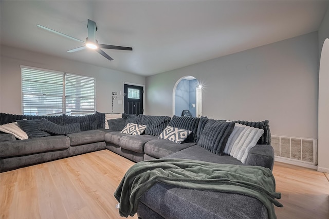 515 Cappamore St, Houston, TX 77013 - living area featuring wood finished floors, a ceiling fan, and baseboards