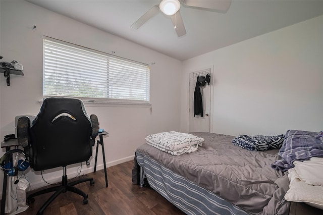 515 Cappamore St, Houston, TX 77013 - bedroom with wood finished floors, a ceiling fan, and a desk