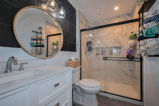 515 Cappamore St, Houston, TX 77013 - bathroom with a marble finish shower, toilet, and vanity