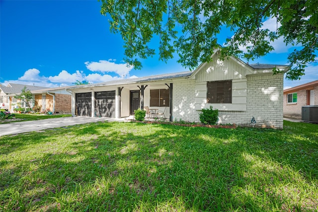 515 Cappamore St, Houston, TX 77013 - ranch-style house featuring brick siding, central AC, an attached garage, and a front yard