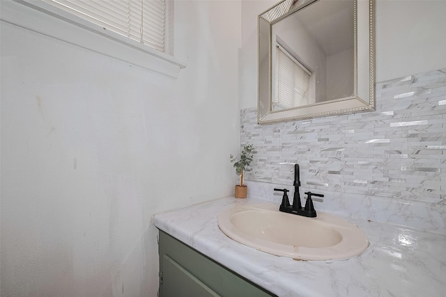 515 Cappamore St, Houston, TX 77013 - bathroom with tasteful backsplash and vanity