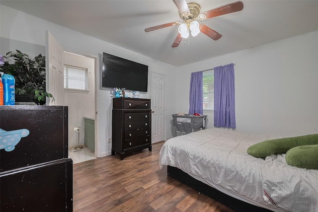 515 Cappamore St, Houston, TX 77013 - bedroom featuring wood finished floors, ensuite bath, and ceiling fan