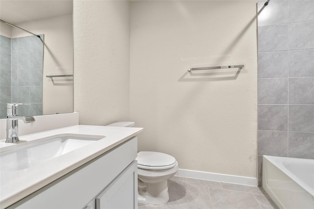 full bathroom featuring tile patterned flooring, vanity, toilet, and tiled shower / bath combo