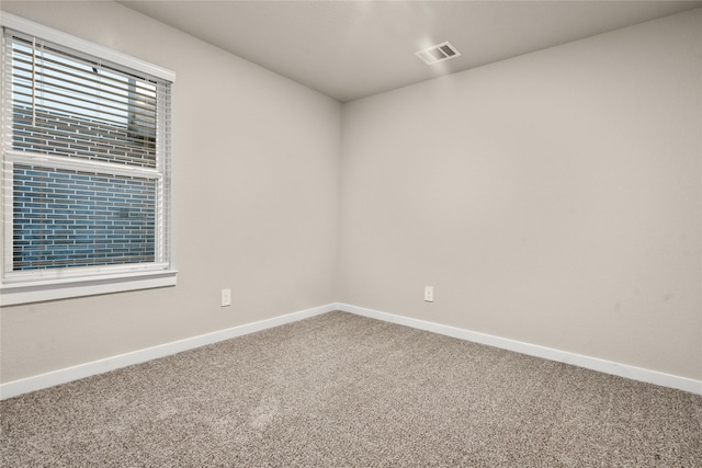 unfurnished room featuring carpet floors