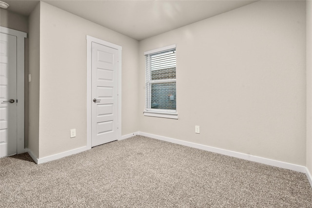 unfurnished bedroom with carpet flooring