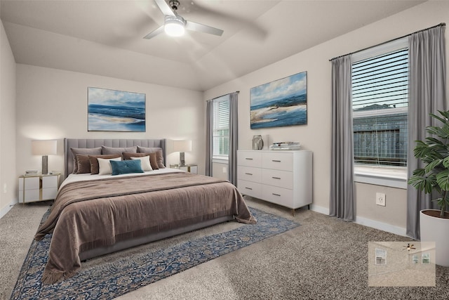 bedroom with ceiling fan, carpet floors, and vaulted ceiling