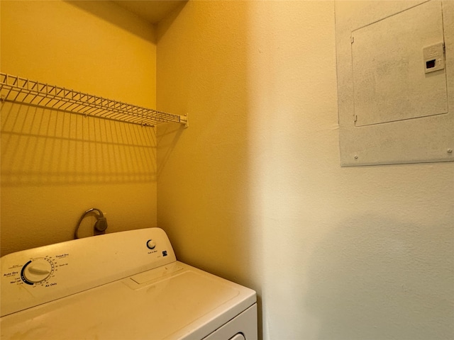 laundry area with washer / dryer and electric panel