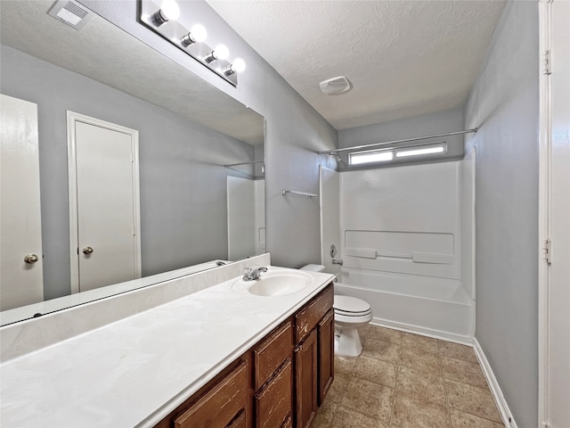 full bathroom featuring bathing tub / shower combination, vanity, a textured ceiling, and toilet