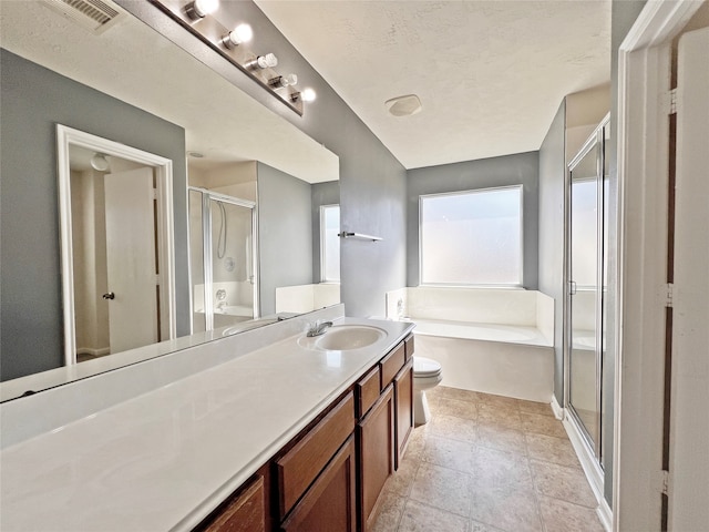 full bathroom with a textured ceiling, vanity, toilet, and shower with separate bathtub