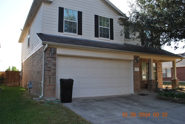 front facade with a garage