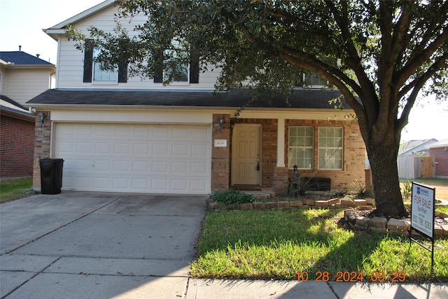 front facade with a garage