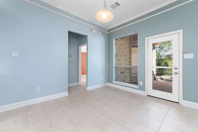 unfurnished room with crown molding