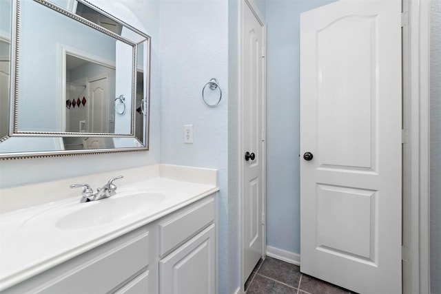 bathroom with vanity and tile patterned floors