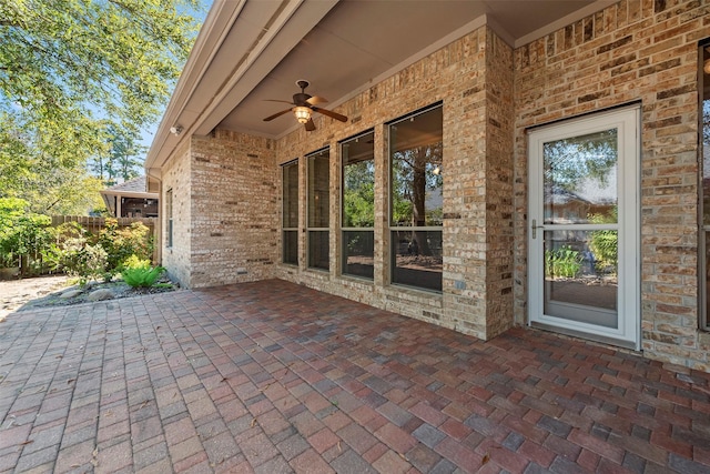 view of patio featuring ceiling fan