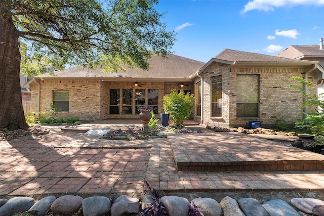 back of house featuring ceiling fan and a patio