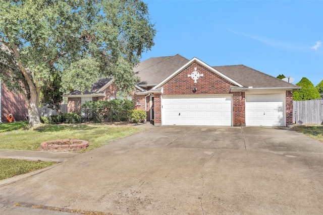 view of front facade with a front lawn and a garage