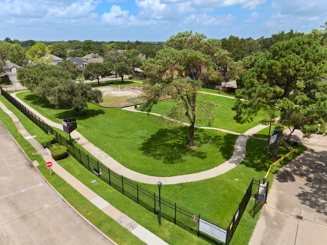 view of home's community featuring a lawn