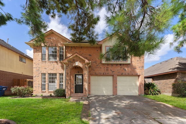 view of front of home featuring a garage and a front lawn