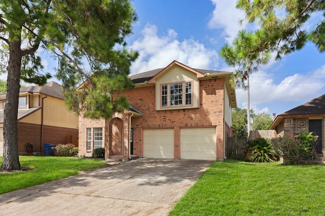 view of front of property with a garage and a front lawn