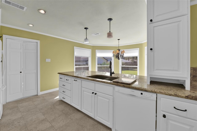 kitchen with dark stone countertops, visible vents, white cabinetry, and dishwasher