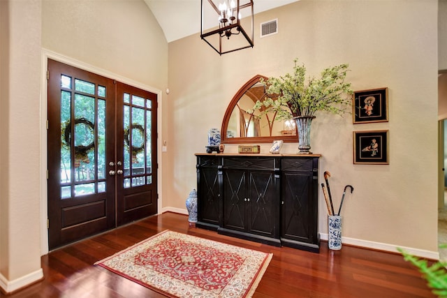 entryway featuring french doors, high vaulted ceiling, and dark hardwood / wood-style floors