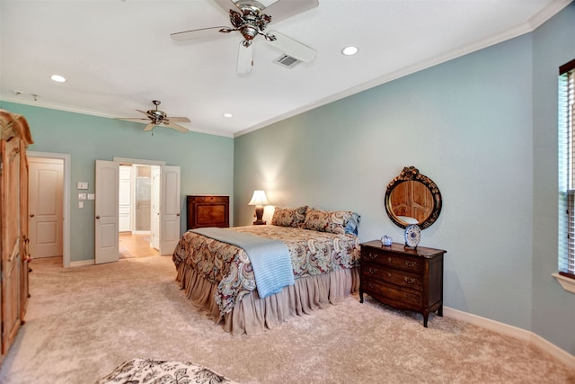 carpeted bedroom featuring crown molding and ceiling fan