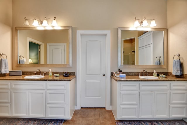 bathroom with vanity and tile patterned flooring