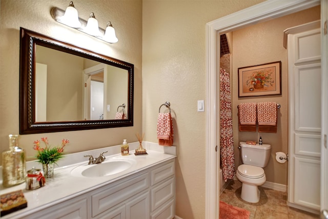 bathroom featuring toilet, a shower with curtain, vanity, and tile patterned floors